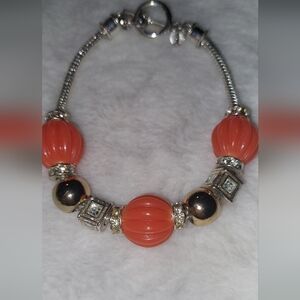 Elegant Silver and Orange Beaded Bracelet